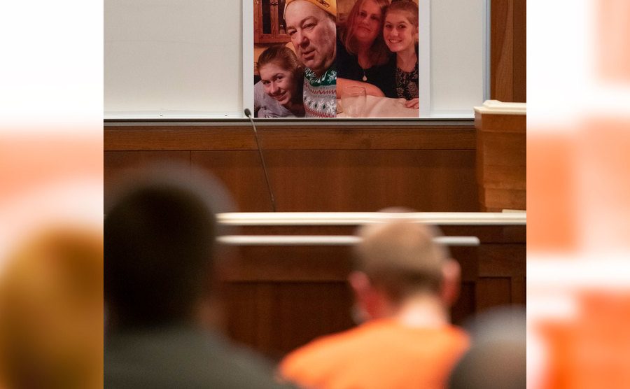 A photo of Jake sitting in court.