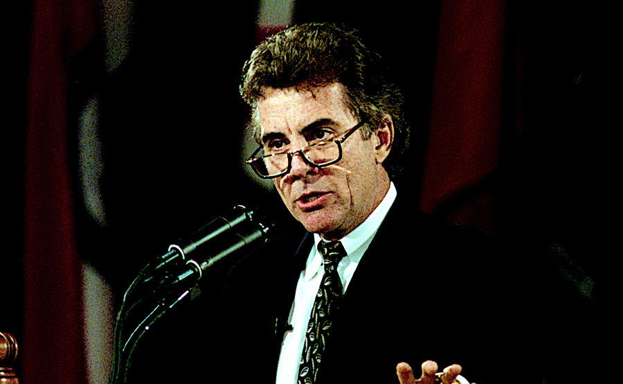 A photo of John Walsh speaking during a Governors's meeting.