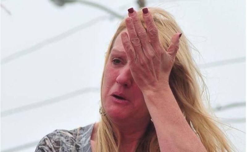 Meri Gilbert cries as she remembers her daughter.