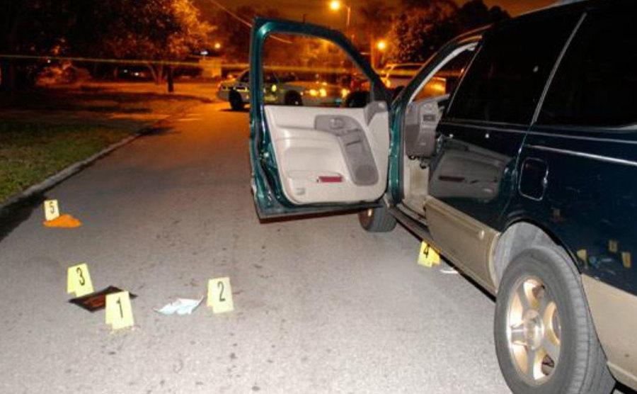 A photo of Rachel’s car marked as evidence at the crime scene.