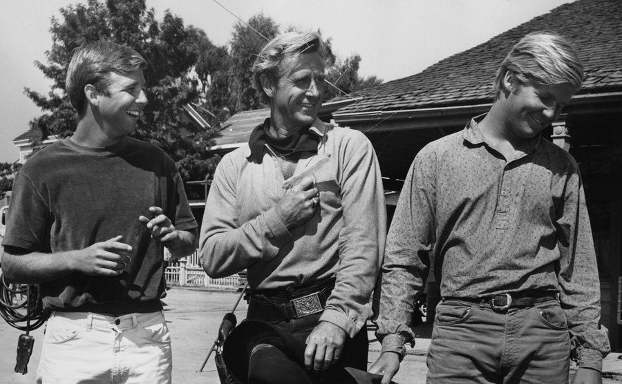 Lloyd Bridges with his sons Beau and Jeff on a western film set. 