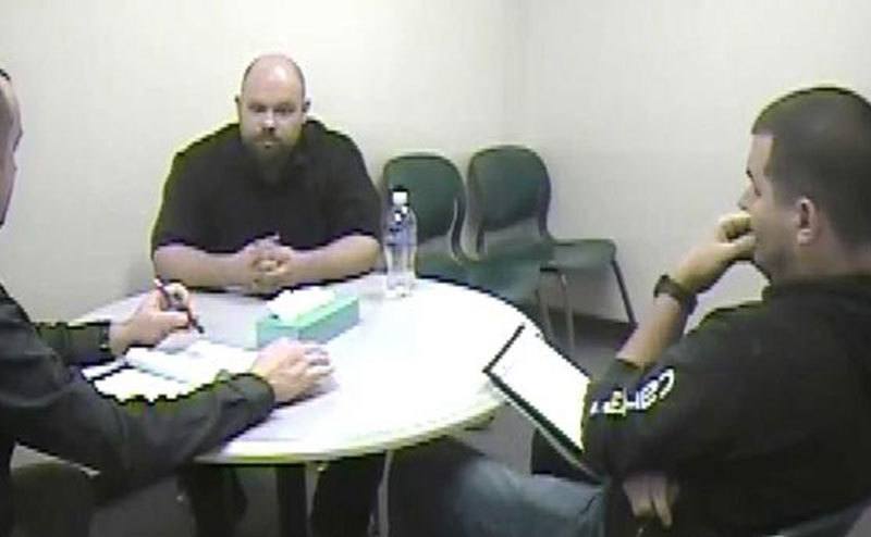 A surveillance photo of Will during interrogation.
