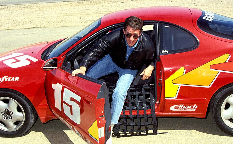 Tim Allen gets out of his car during the 1992 Toyota Grand Prix.