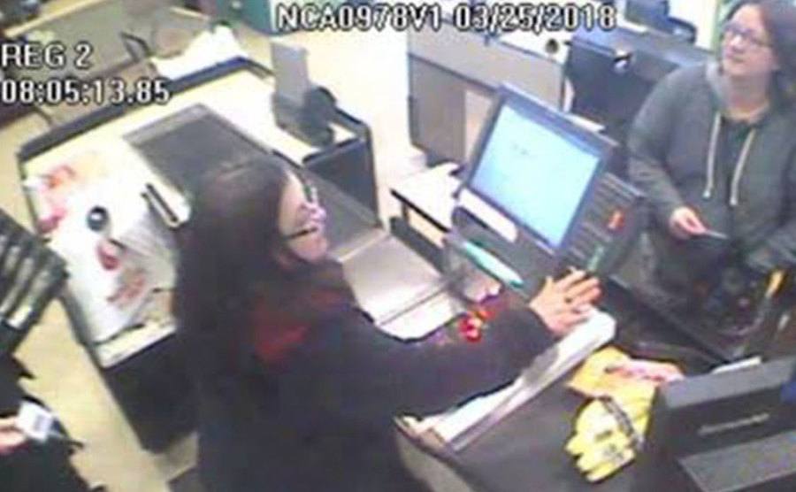 A surveillance tape shows Jennifer buying groceries.