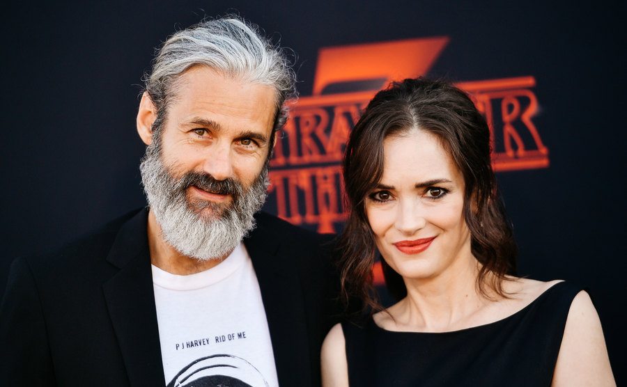 Scott Mackinlay Hahn and Winona Ryder attend an event.