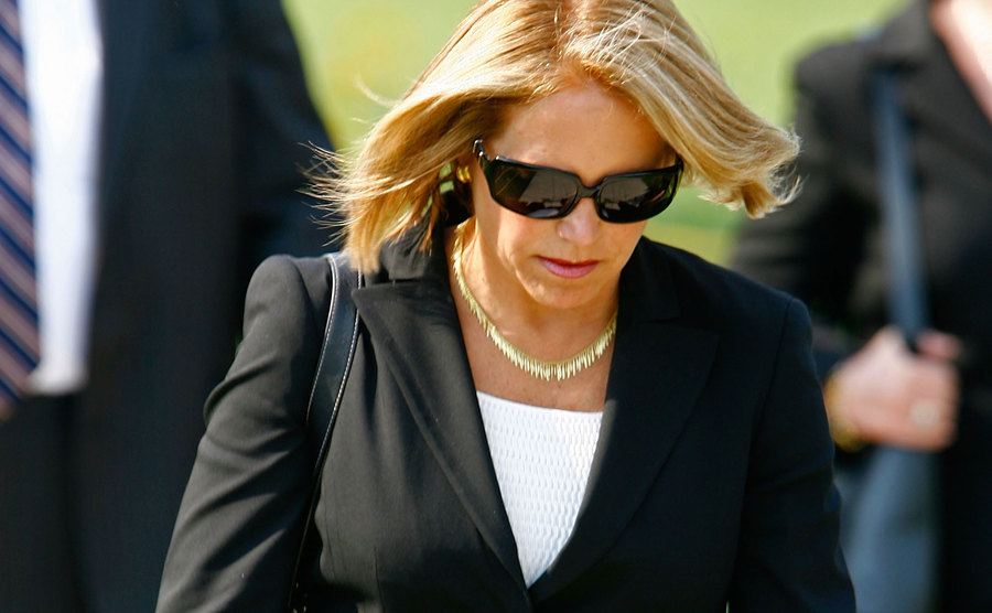 An image of Katie leaving a memorial service.
