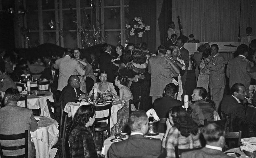 An image of dinners and dancers at a nightclub on the Sunset Strip.