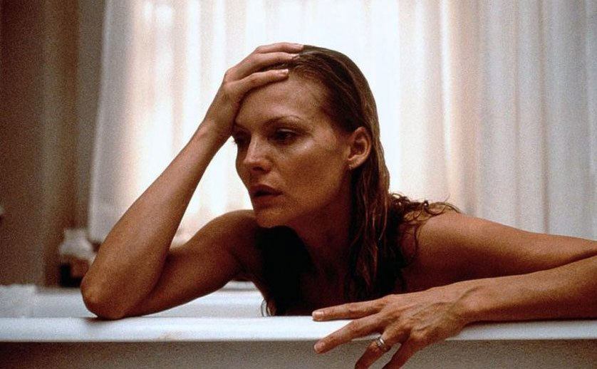 Michelle Pfeiffer is in a bathtub in a scene from What Lies Beneath. 