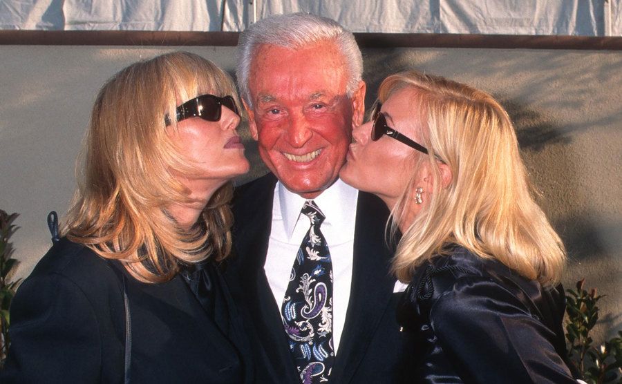 Janice Pennington, Bob Barker, and Chantel Dubay pose for the press during an event.