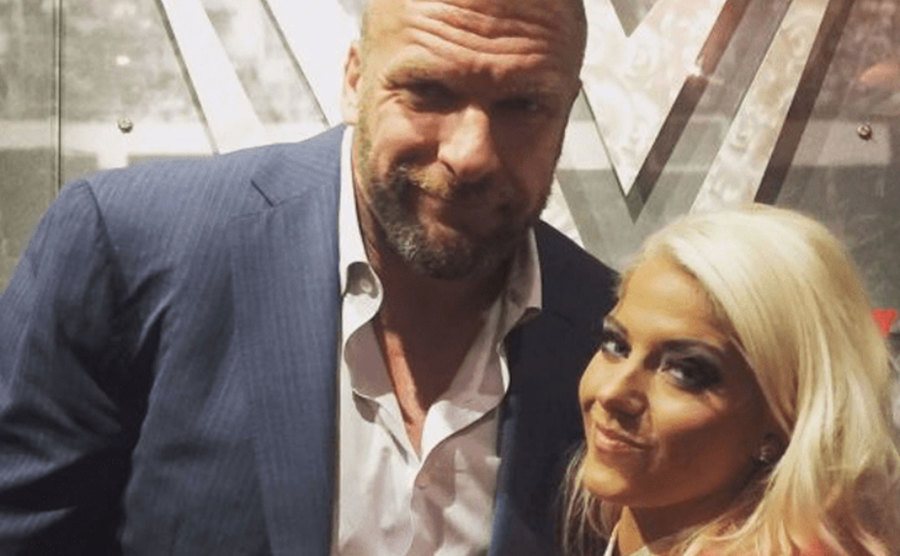 A picture of Triple H and Alexa.