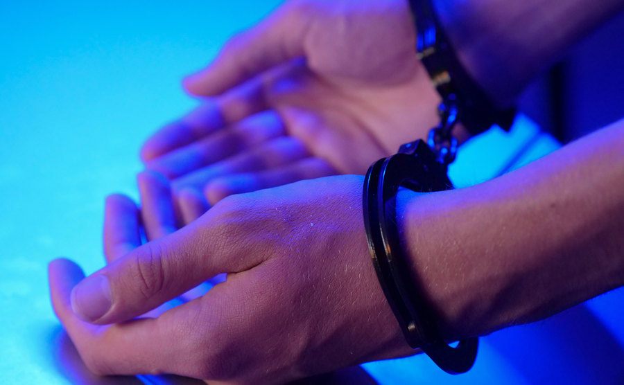 An image of a man in handcuffs.