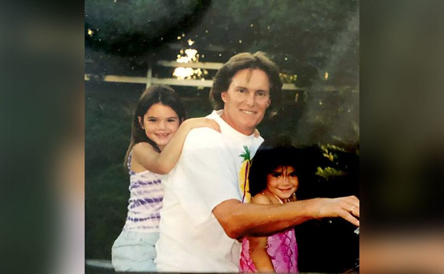 An old photo of Kendell, Bruce, and Kylie. 