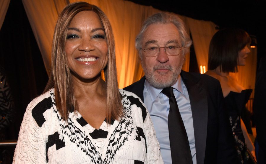 A photo of Grace and De Niro during an event.