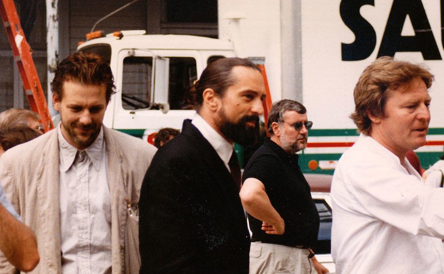 A backstage picture of Rourke and De Niro walking on the set.