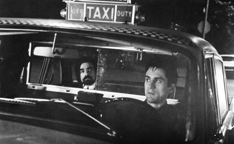 A photo of Scorsese and De Niro inside a taxi in Taxi Driver.