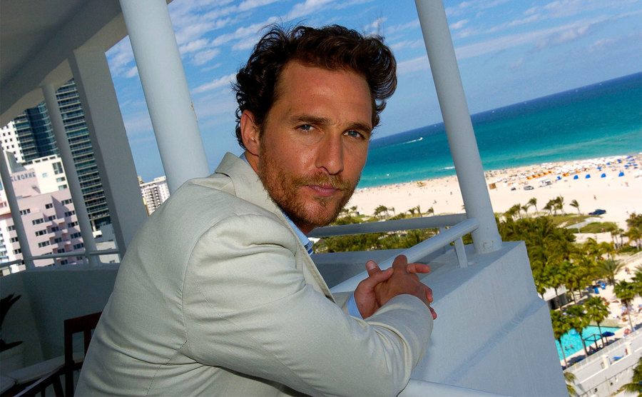 Matthew McConaughey looks out from his hotel balcony. 
