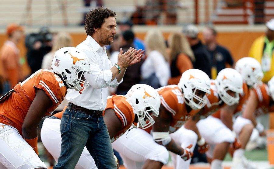 Matthew McConaughey encourages the Texas Longhorns before the game.