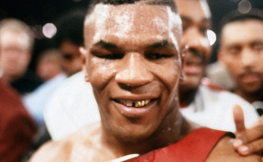 A dated image of Tyson after winning a fight.