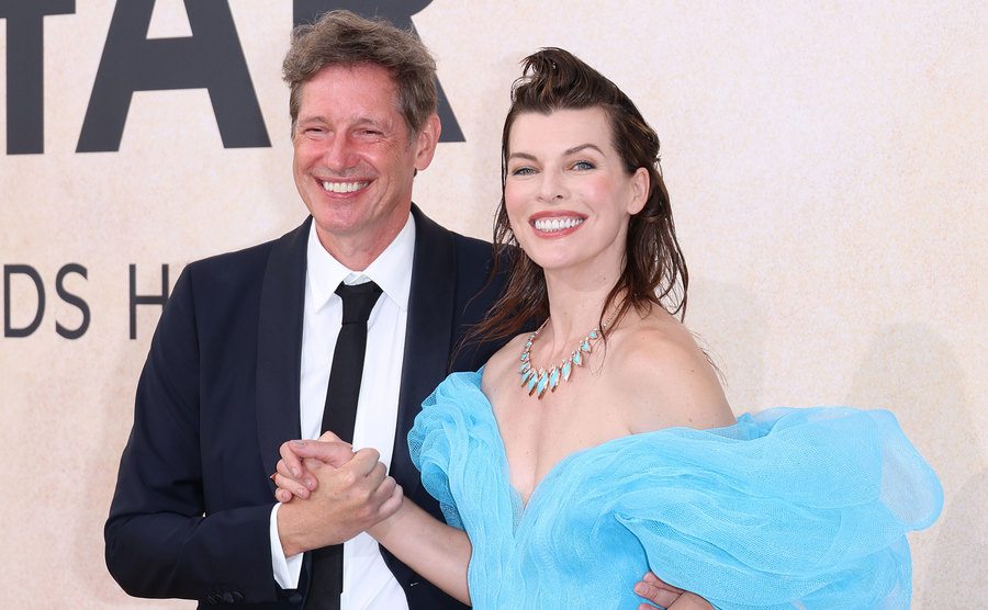 Paul W.S. Anderson and Jovovich pose for the press.