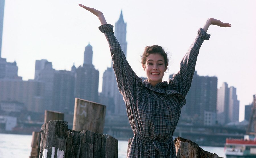 Sean Young poses on the New York City skyline. 