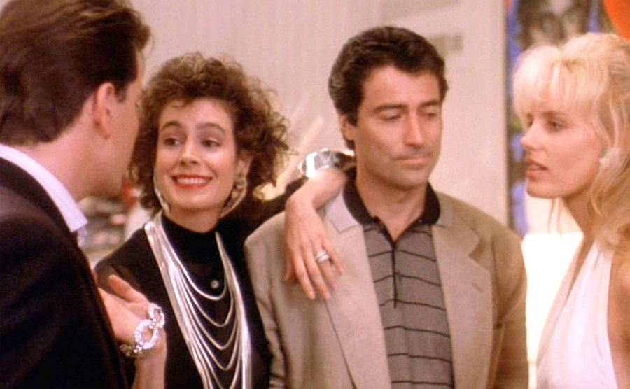 Sean Young plays the hostess in a still from Wall Street. 