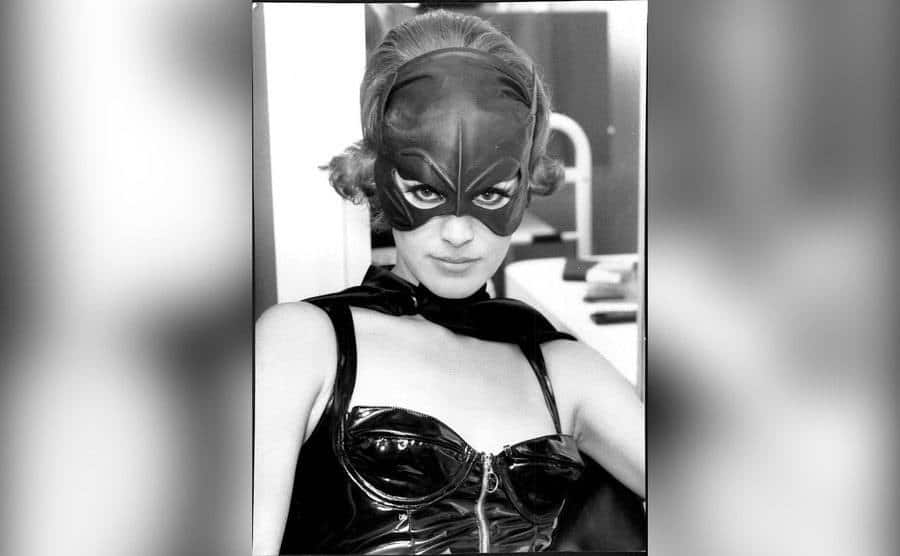 Sean Young poses in her cat woman costume. 