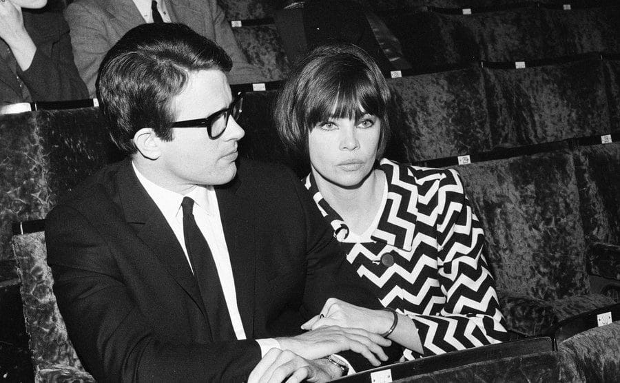 A picture of Warren Beatty and Leslie Caron at a theatre.
