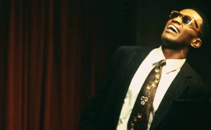 A still of Foxx in the character of Ray Charles.