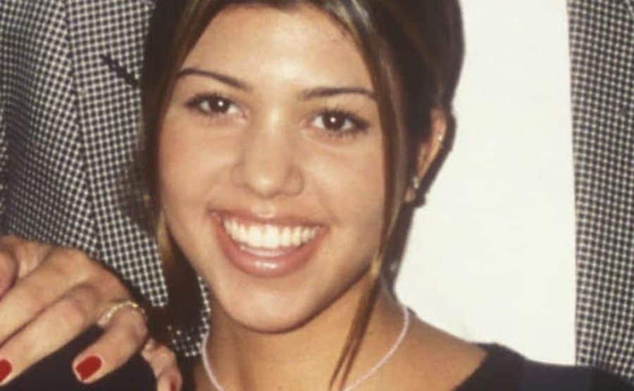 A dated portrait of Kourtney during her college years.