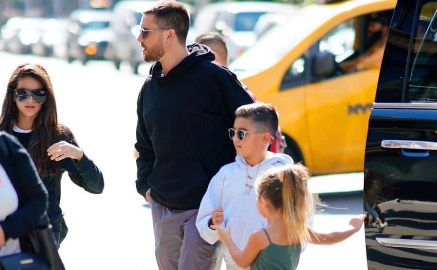 Scott and Kourtney take their kids Mason, Penelope, and Reign to lunch.