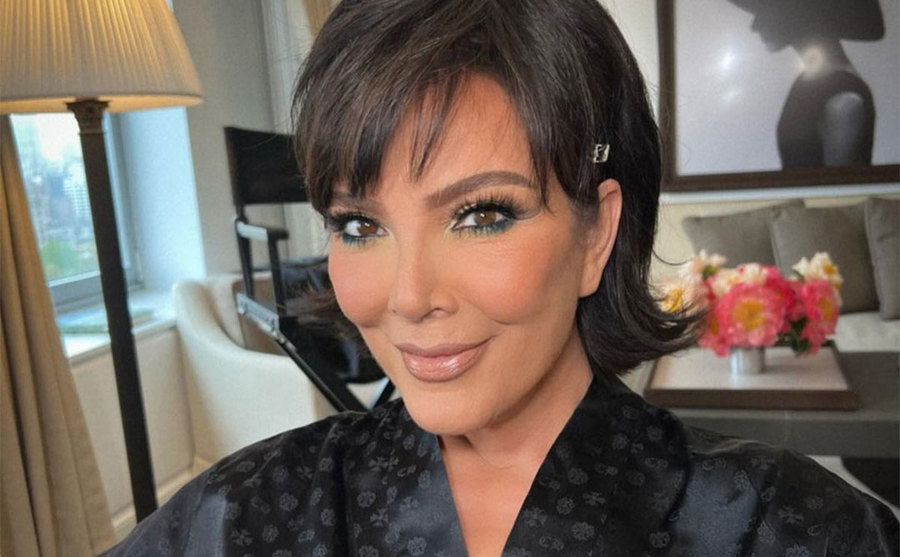 Kris Jenner poses in a portrait for Poosh.