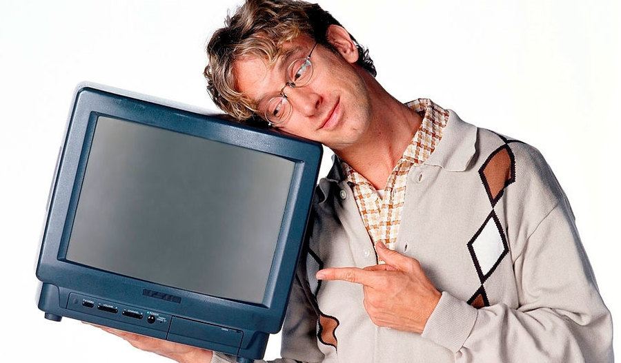 Andy Dick poses with a TV as Matthew Brock.