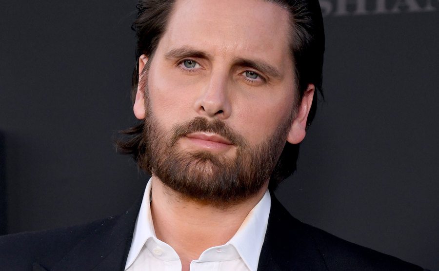 Scott Disick poses for the press.