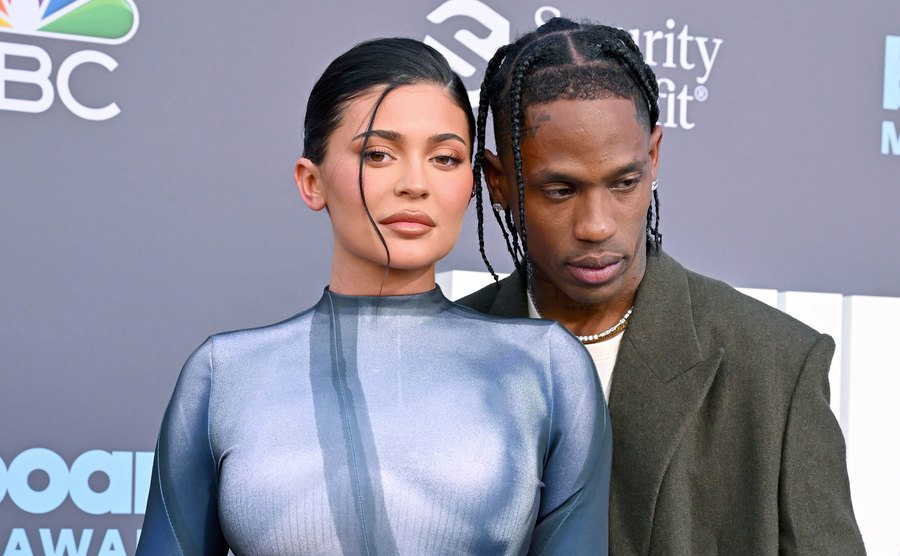 Kylie Jenner and Travis Scott pose for the press.