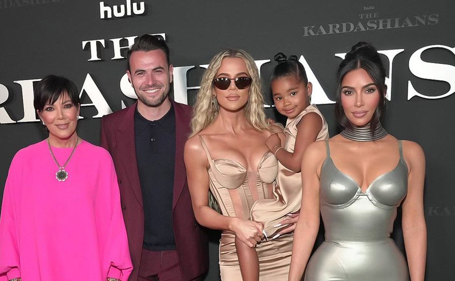 Kris Jenner, Ben Winston, Khloé Kardashian, True Thompson, and Kim Kardashian attend an event.