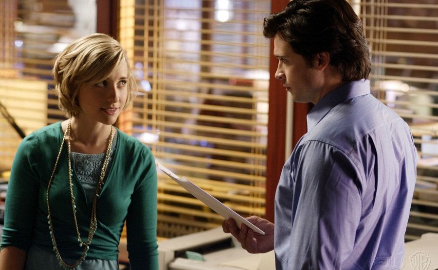 A still of Allison Mack and Tom Welling in a scene from Smallville.