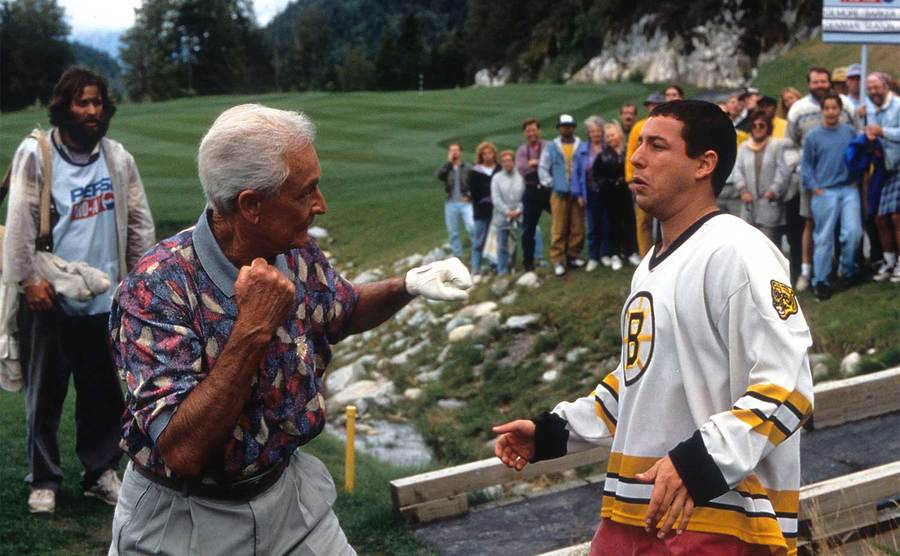 Bob Barker prepares to punch Adam Sandler in a scene from the film 'Happy Gilmore'