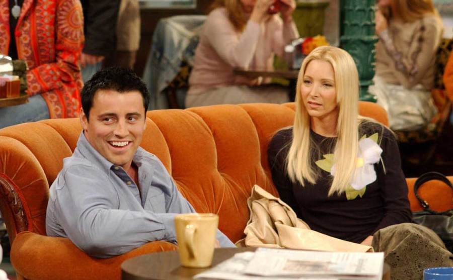 Joey and Phoebe sit in the coffee shop. 