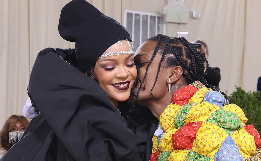 A$AP gives Rihanna a kiss on the cheek at the Met Gala red carpet. 