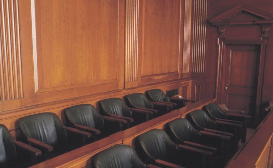 A photo of an empty jury box in court.