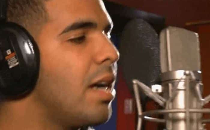 Drake is in the recording studio. 
