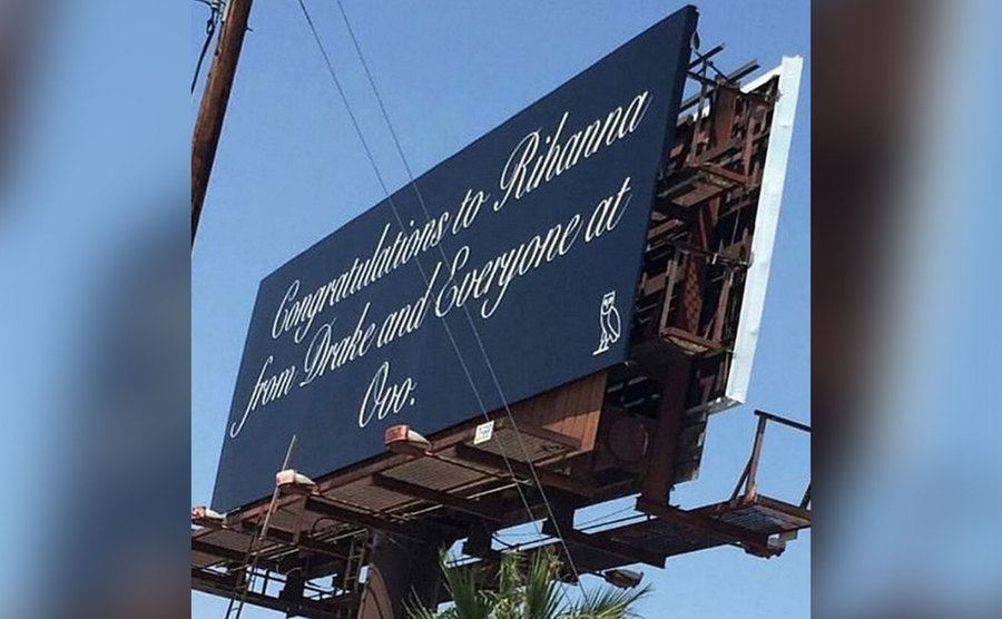 A billboard congratulating Rihanna from Drake. 