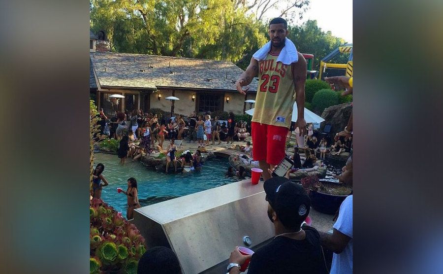 Drake is hosting a house party at his estate. 