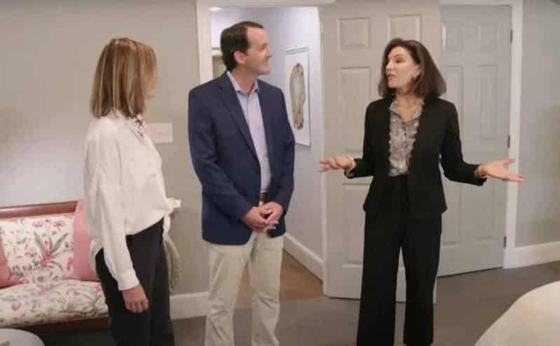 Hilary Farr shows off a home to a couple. 